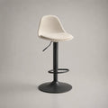 Sgabello da bar regolabile 65-85 cm con seduta in PU beige e struttura in acciaio nero con base circolare e poggiapiedi